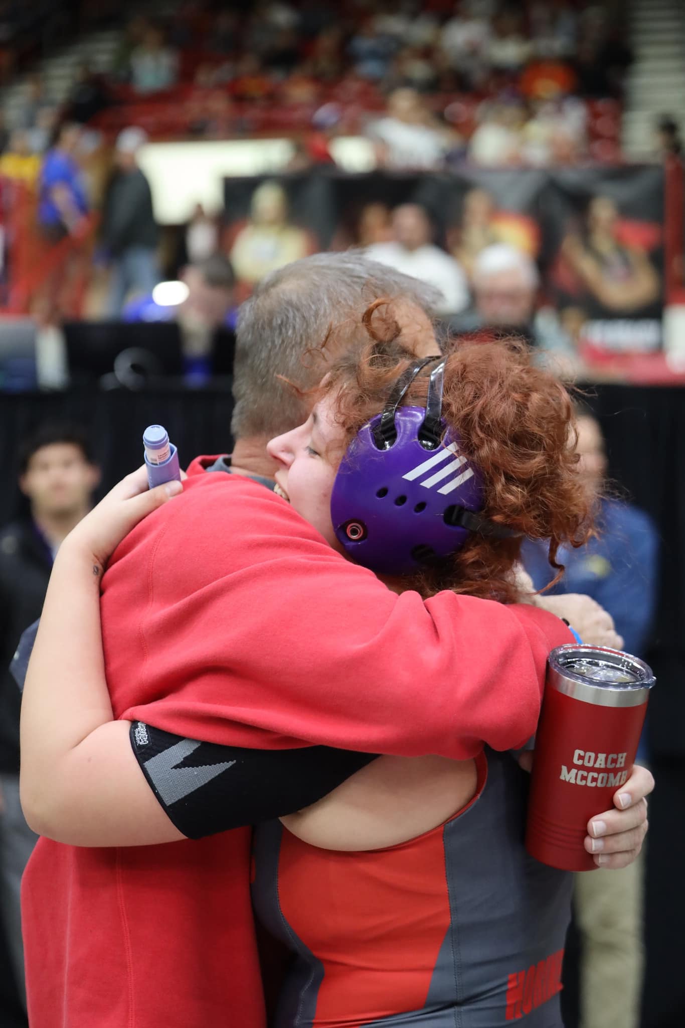 Kaylee and Mitch McComb hug