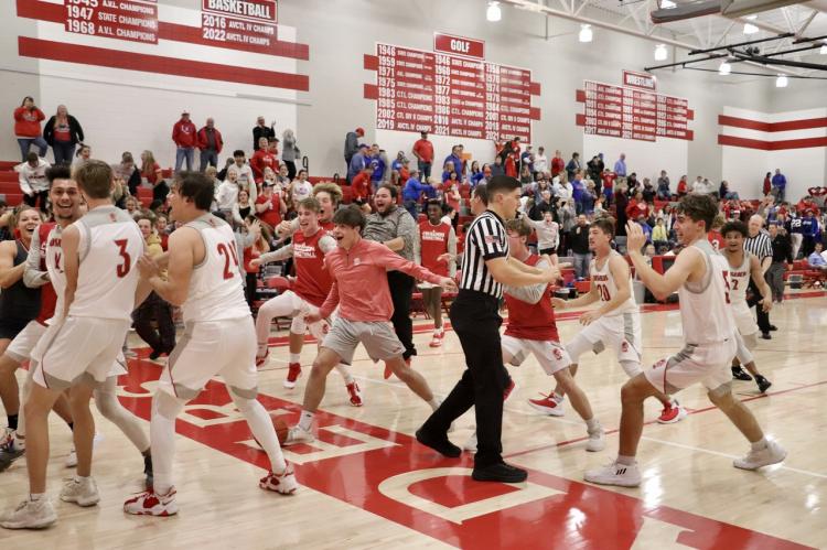 post game celebration boys basketball