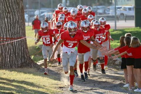 crusader football crossing the bridge